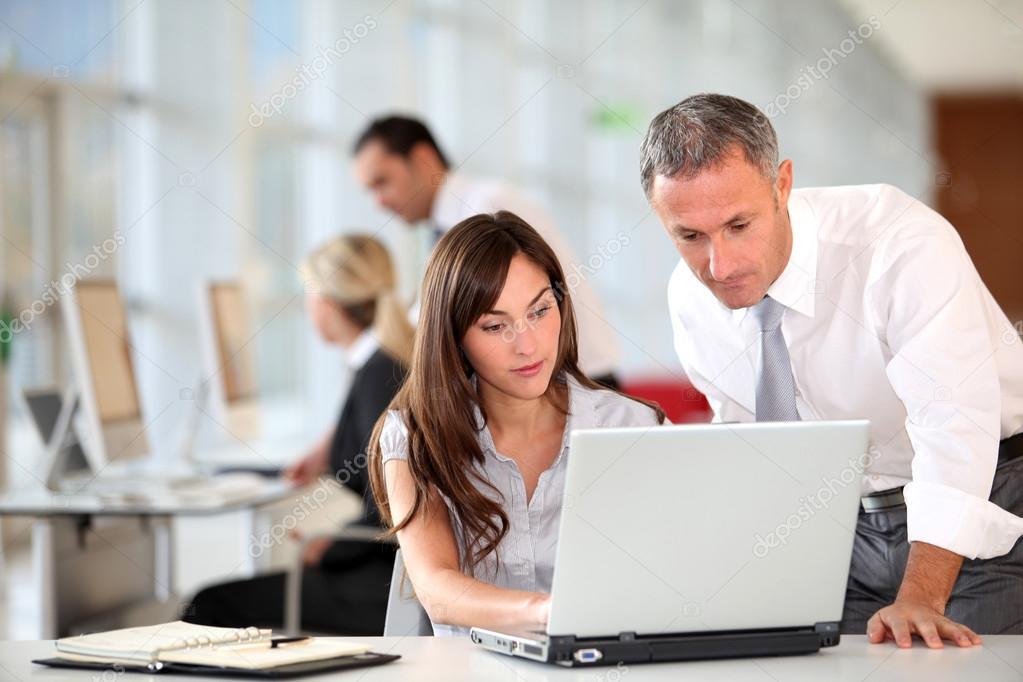 depositphotos_18225561-stock-photo-manager-and-secretary-working-in.jpg