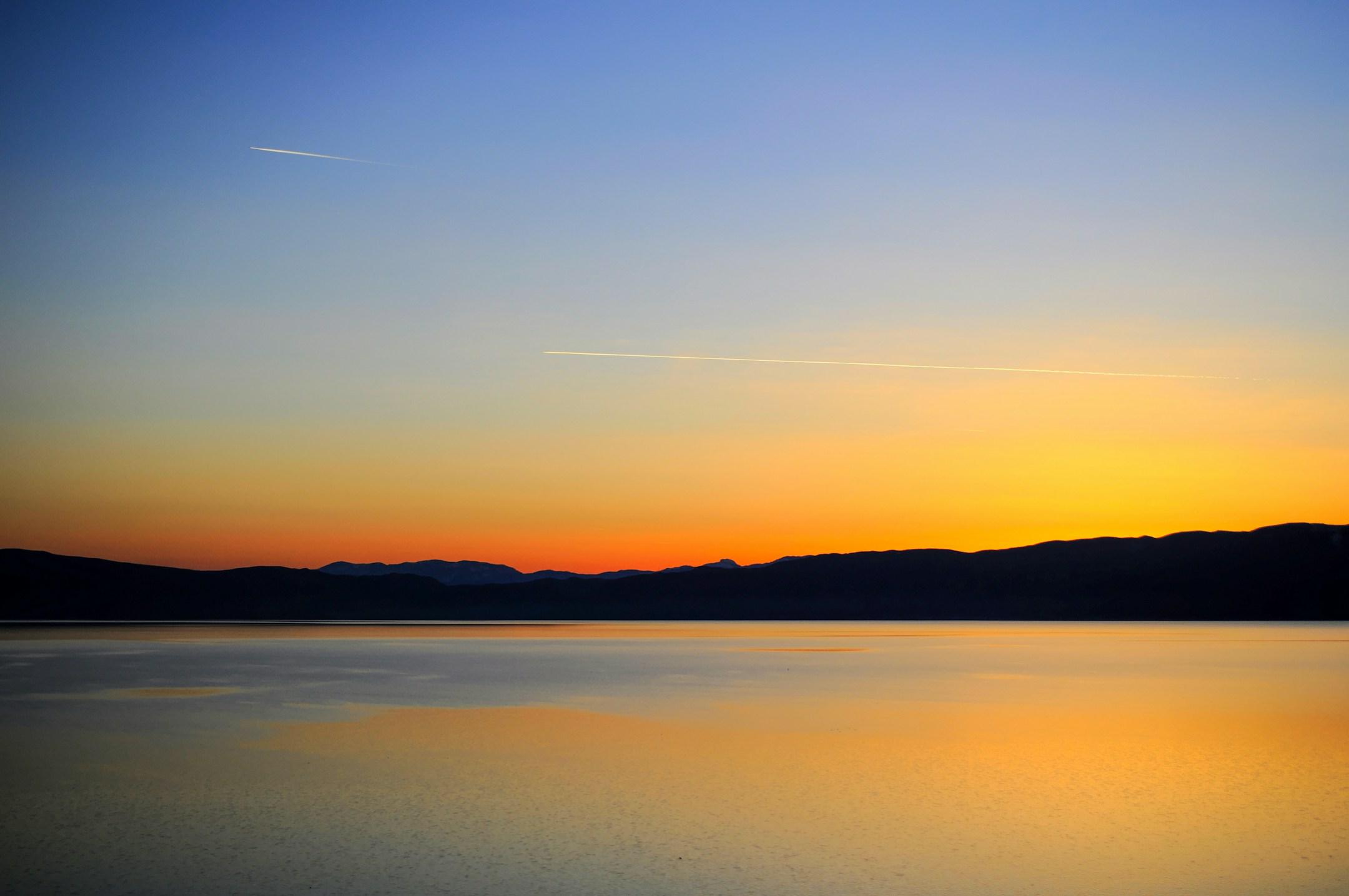 Sunset over the water of the lake