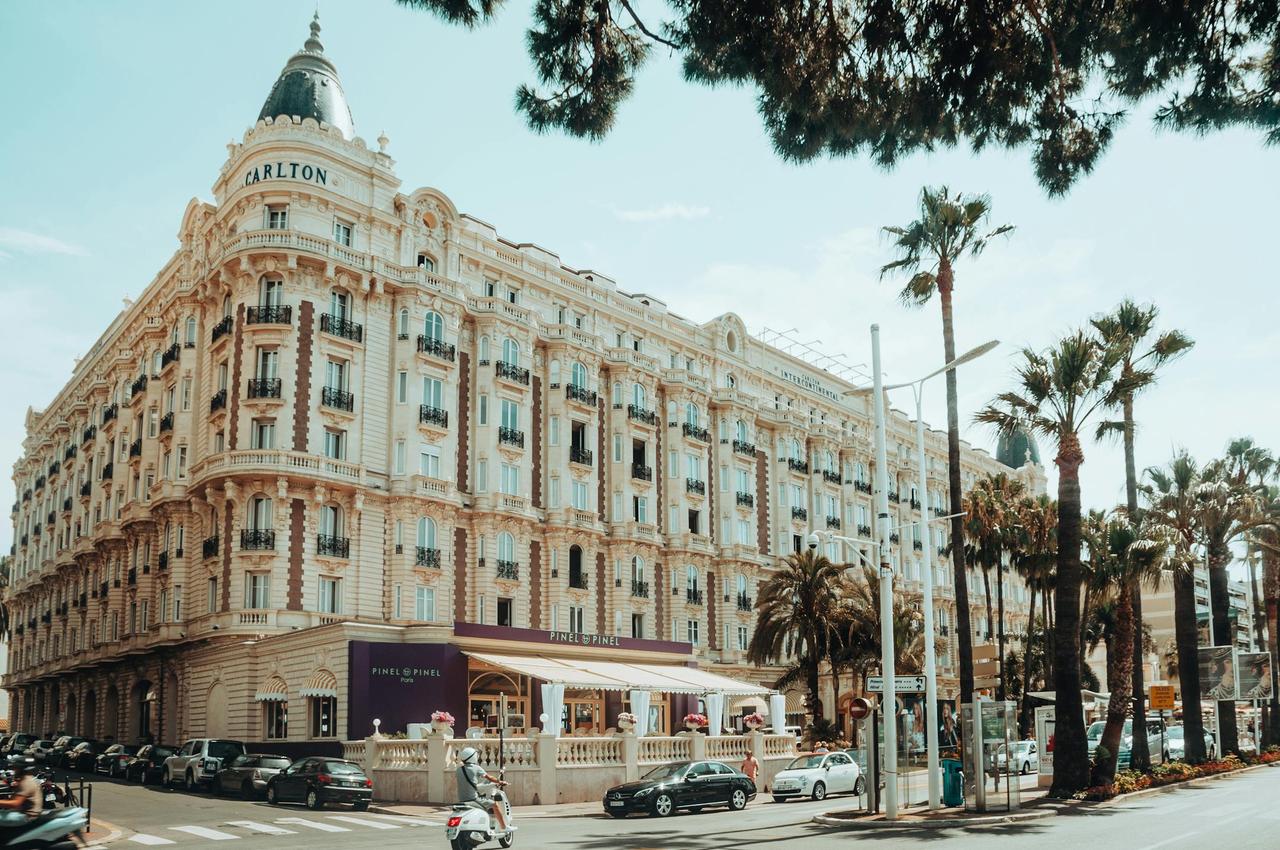 Elegant historic architecture of the Carlton Hotel in Cannes, France.