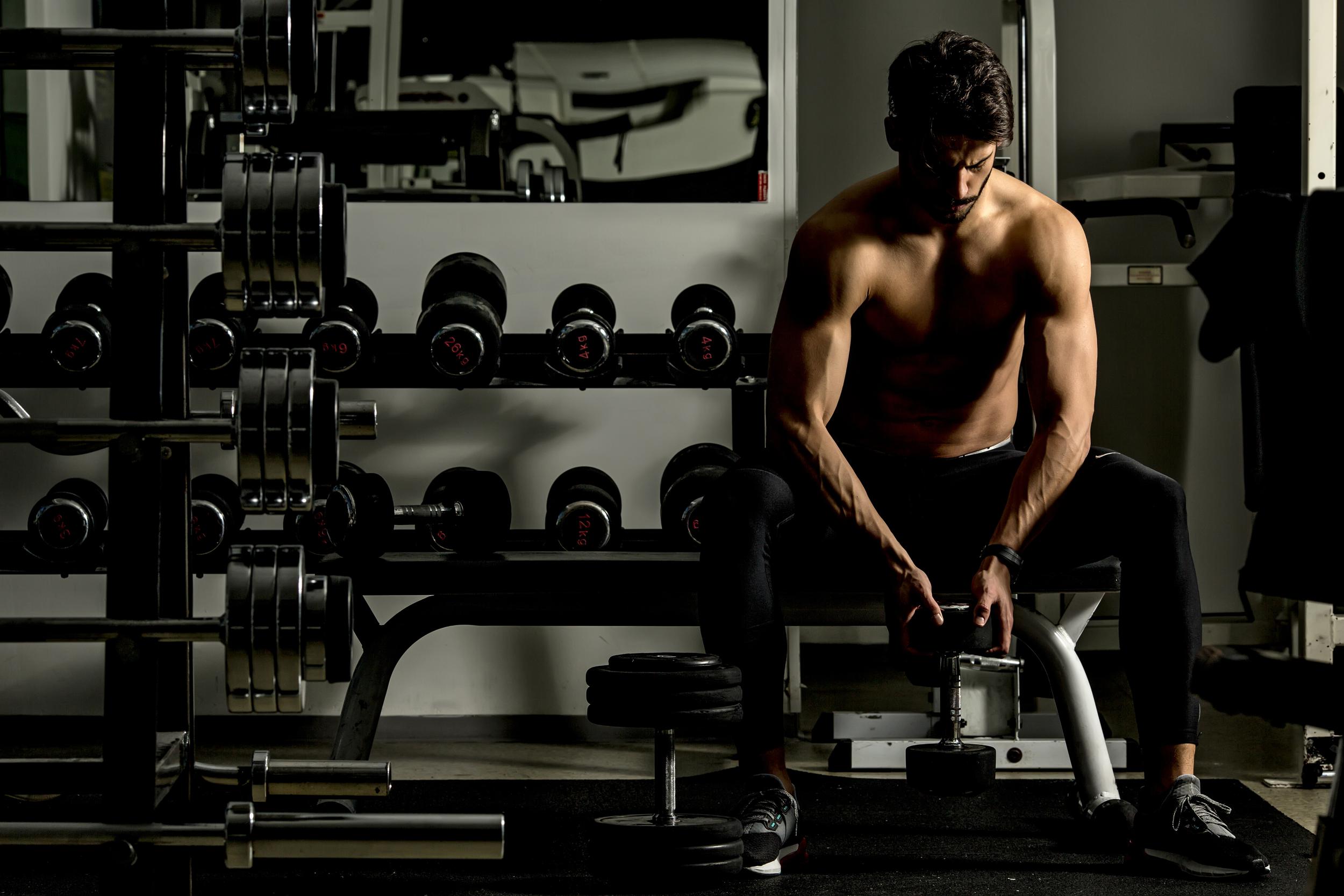 Young man training in gym