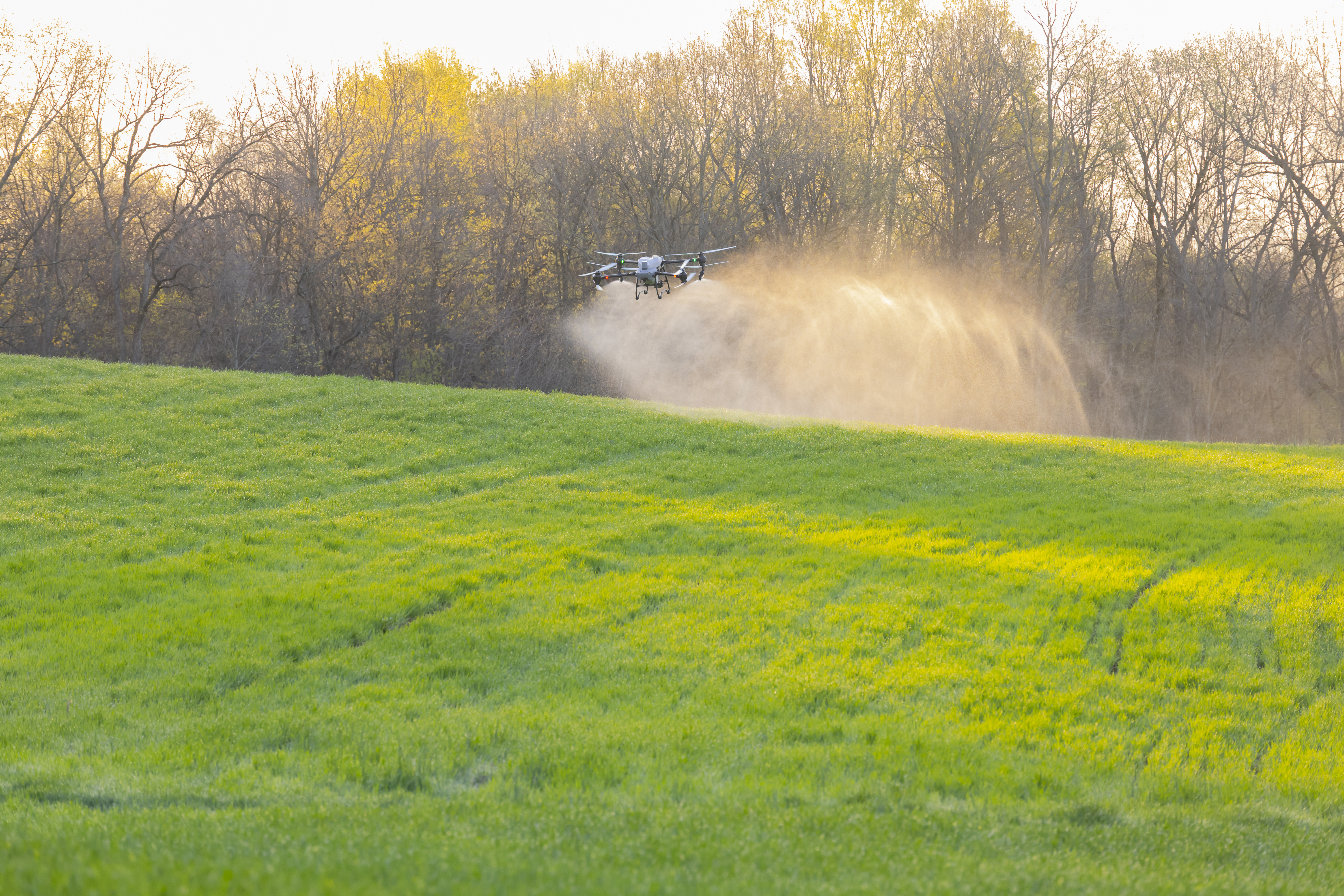 Drone spraying crops over Middle Tennessee farms