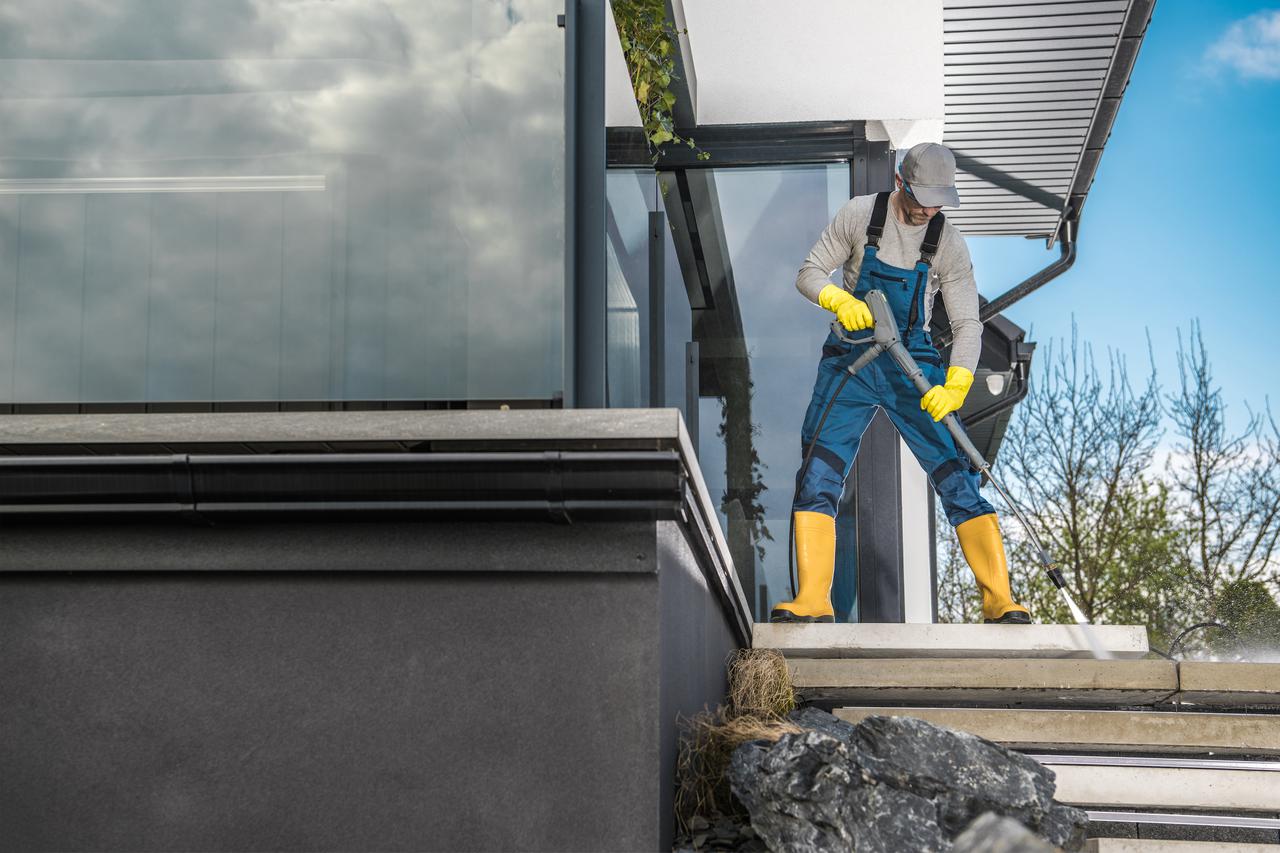 Man cleaning a roof