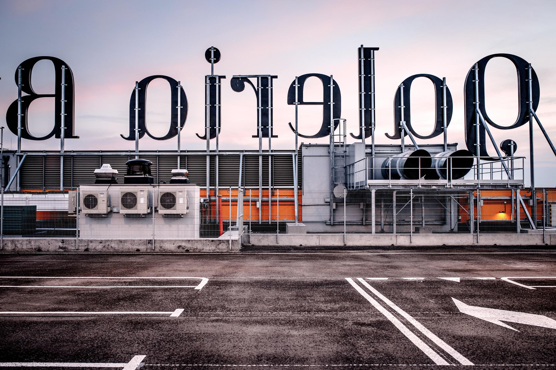 Rooftop HVAC units on top of a shopping center.