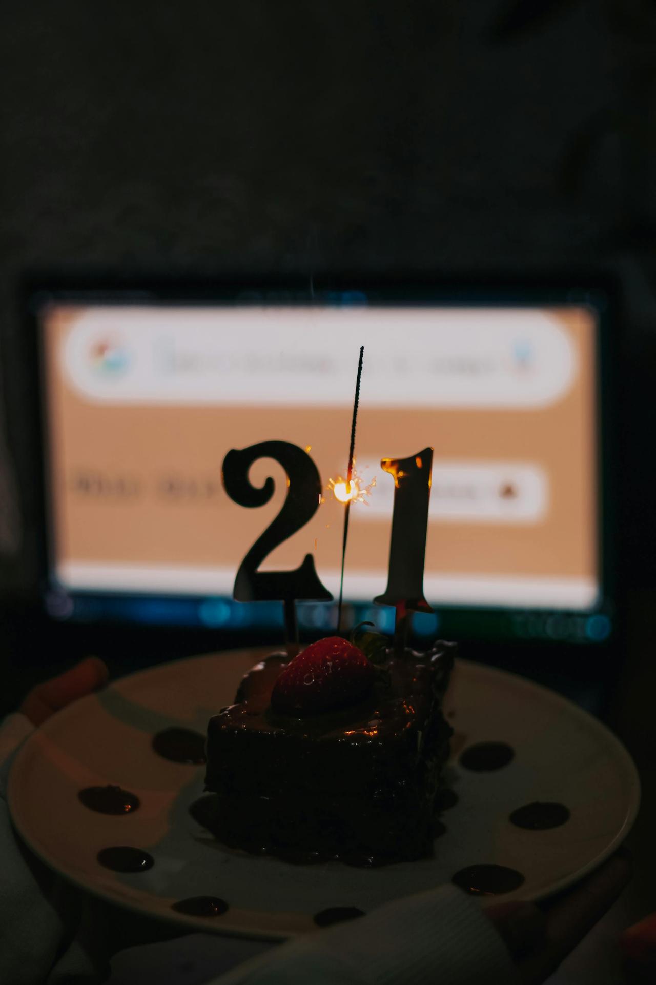 A festive 21st birthday cake with sparklers, perfect for celebrating this milestone.