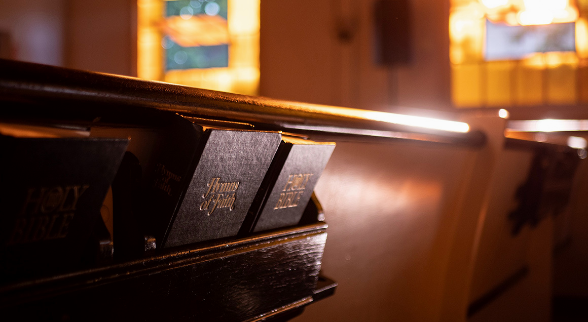 stock-hymnal-and-bible-on-back-of-pew-1754009729142.jpg