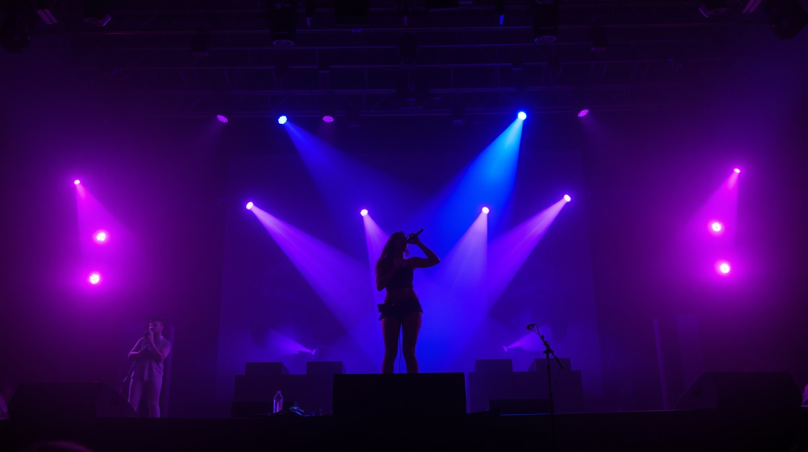 Concert stage with dramatic purple lighting
