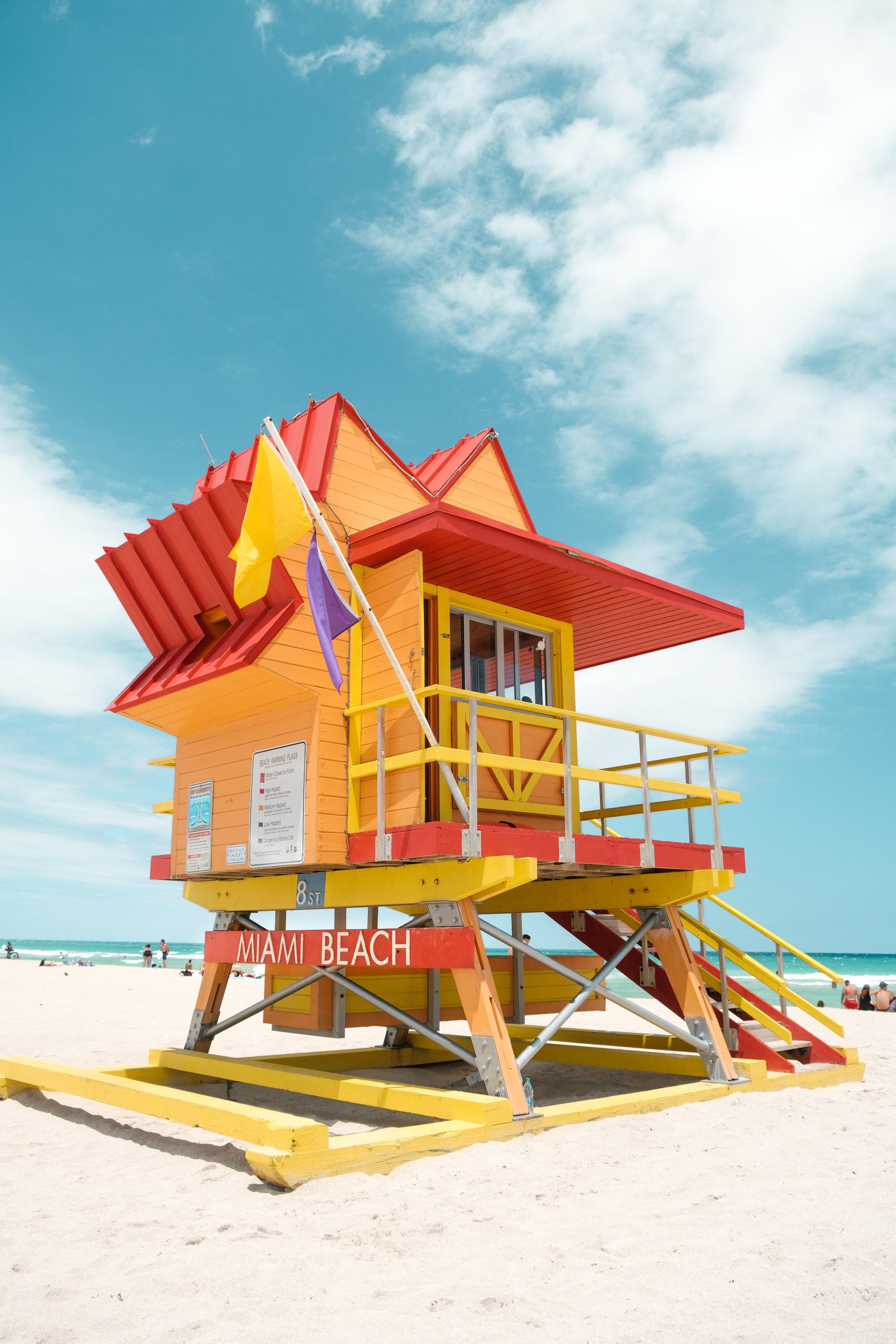 Image of a lifeguard hut painting bright orange and red because they used a local paint manufactuer.