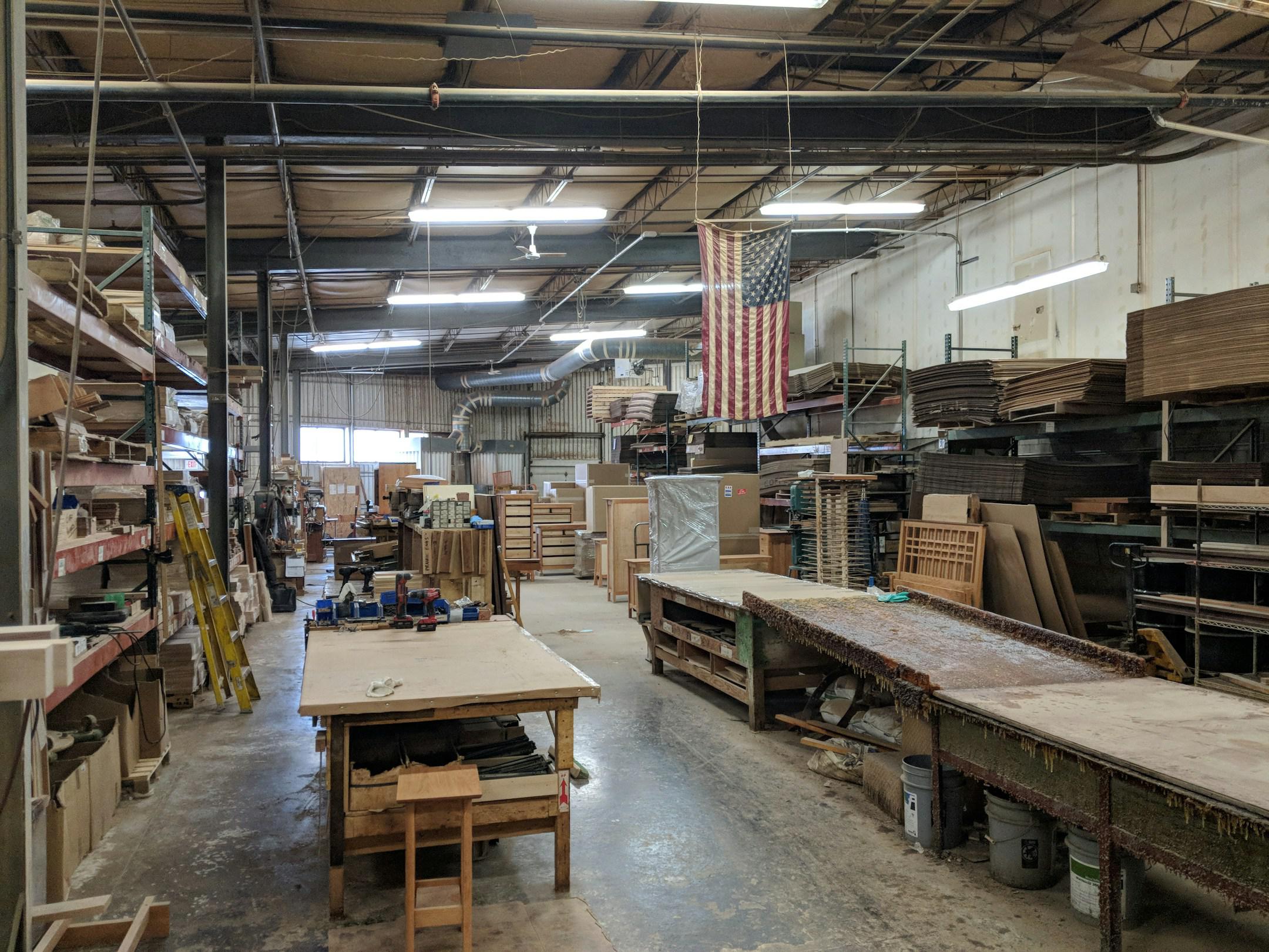 This image was captured at Vermont Furniture Designs in Winooski, VT. To me, the flag hanging from the ceiling makes this an iconic image of American craftsmanship. One of my favorite furniture related photos.