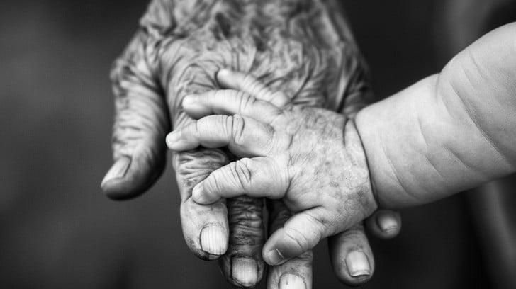 generations-holding-hands-stockcake.jpg