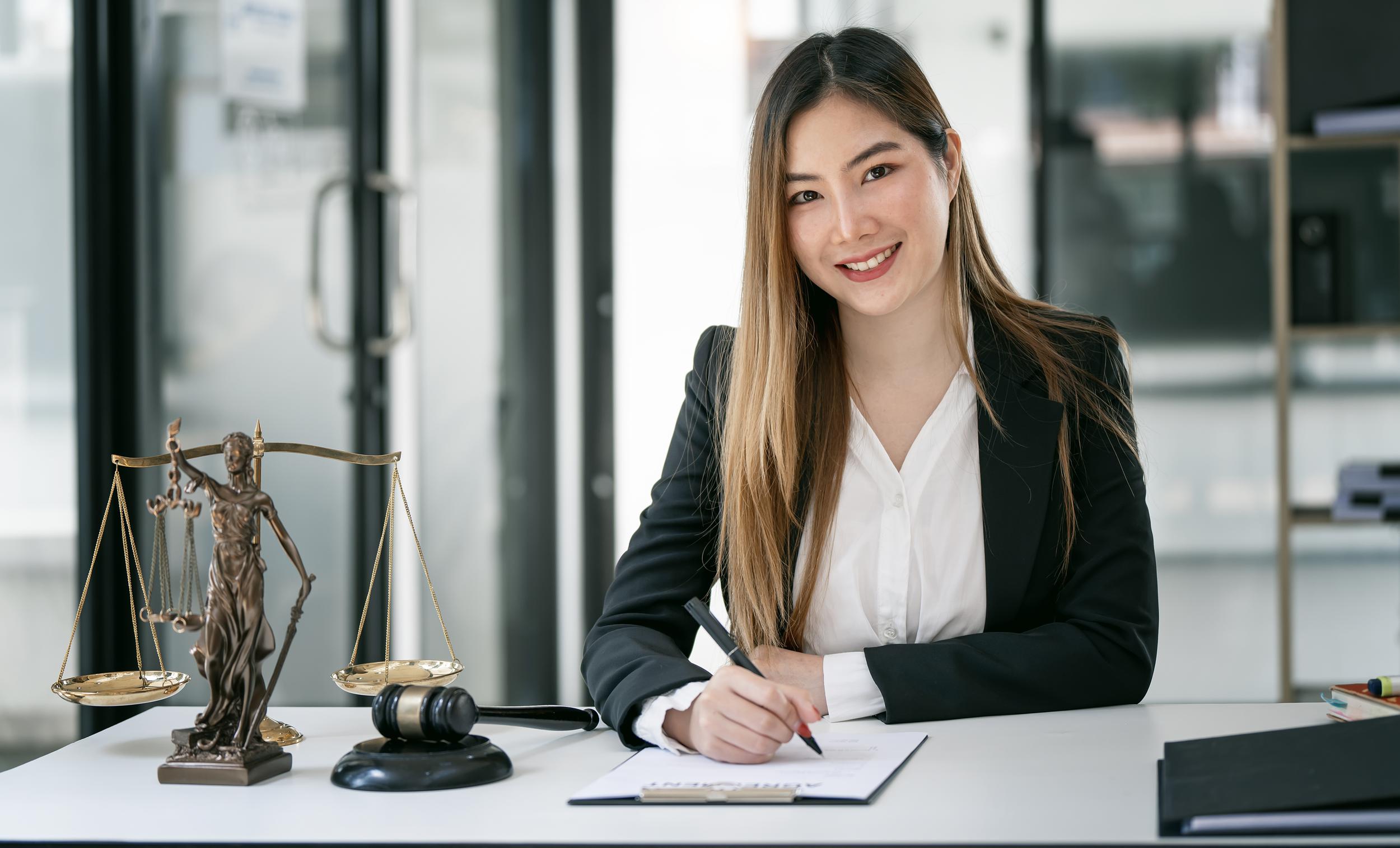 portrait-of-young-female-lawyer-or-attorney-workin-2023-05-09-22-35-24-utc.jpg