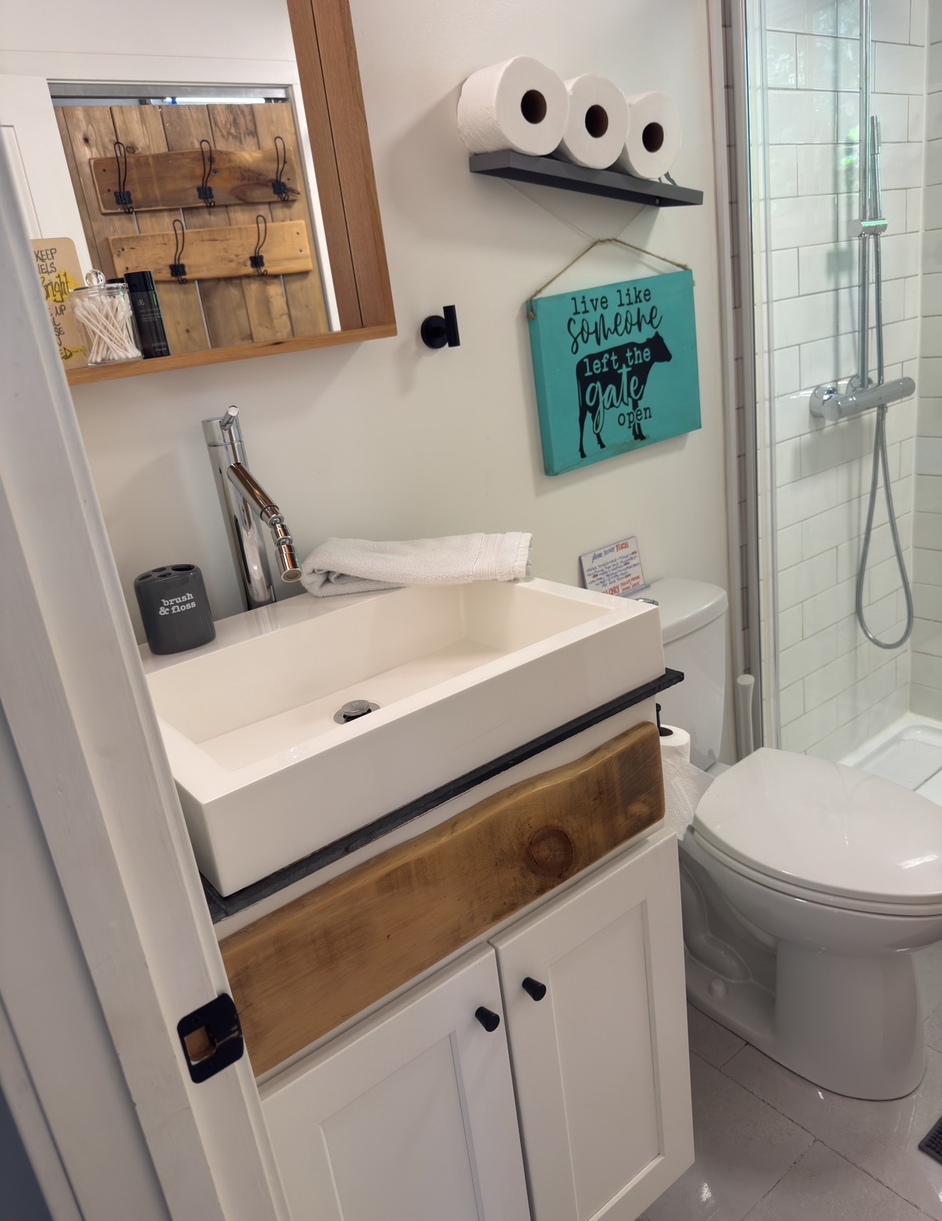 Pristine cottage bathroom with white sink