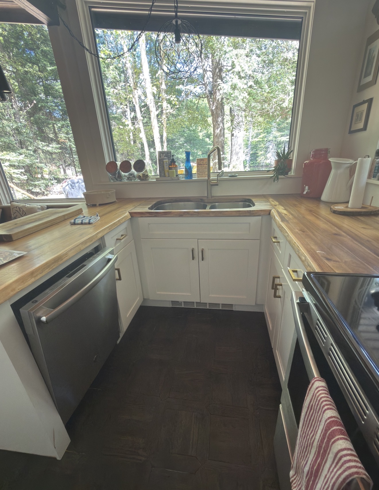 Kitchen with window overlooking forest