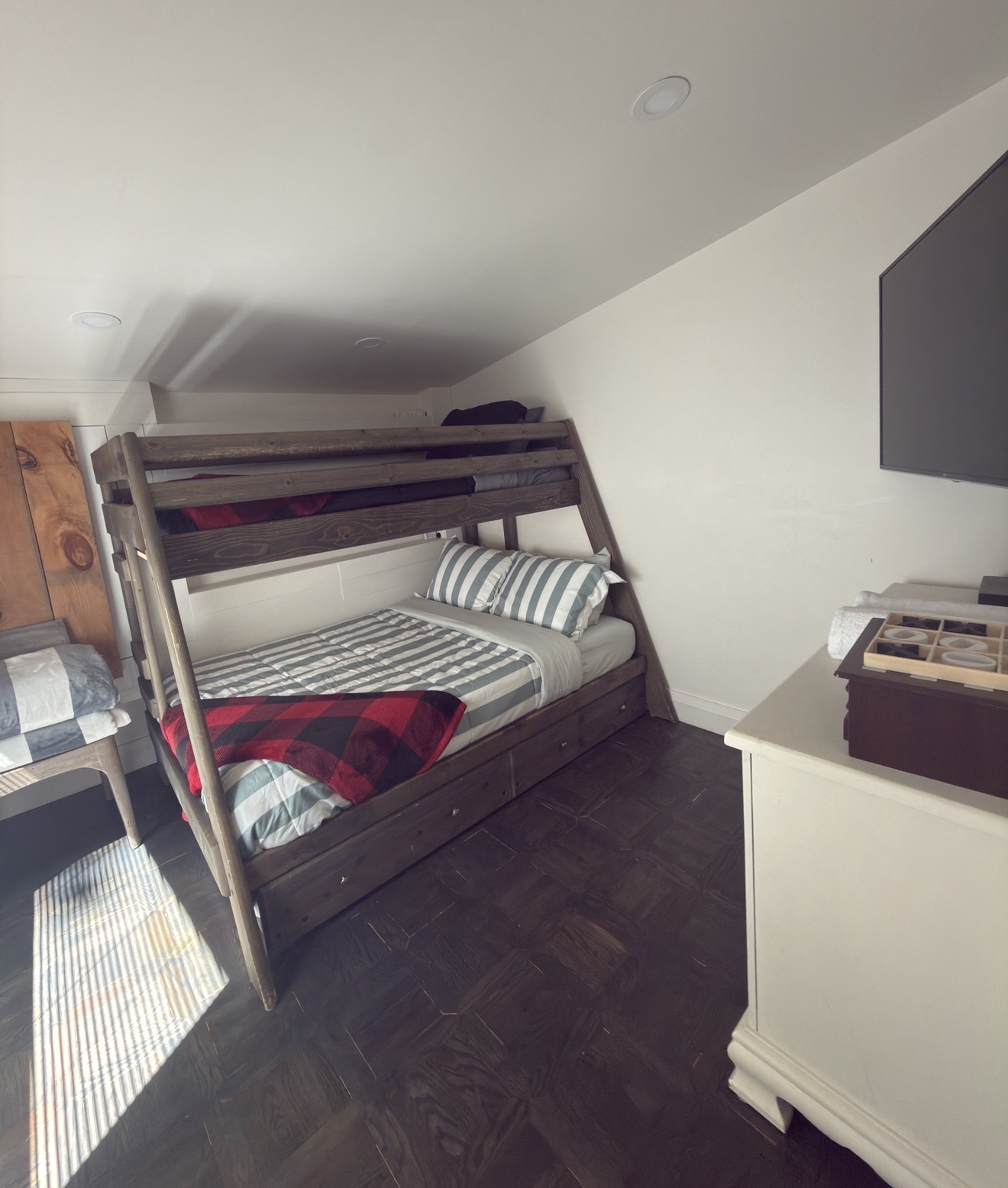 Clean cottage bedroom with bunk beds