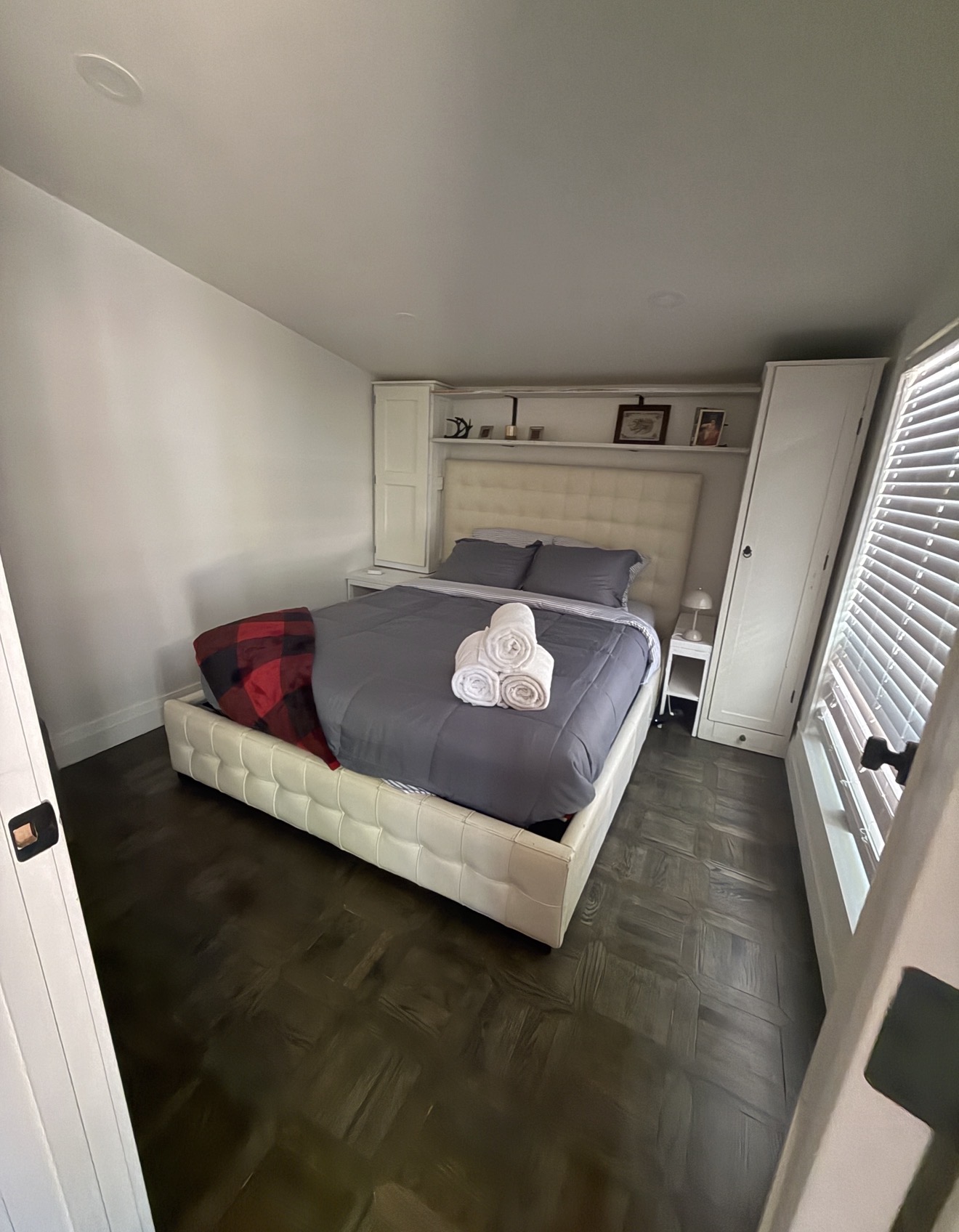 Master bedroom with pristine linens