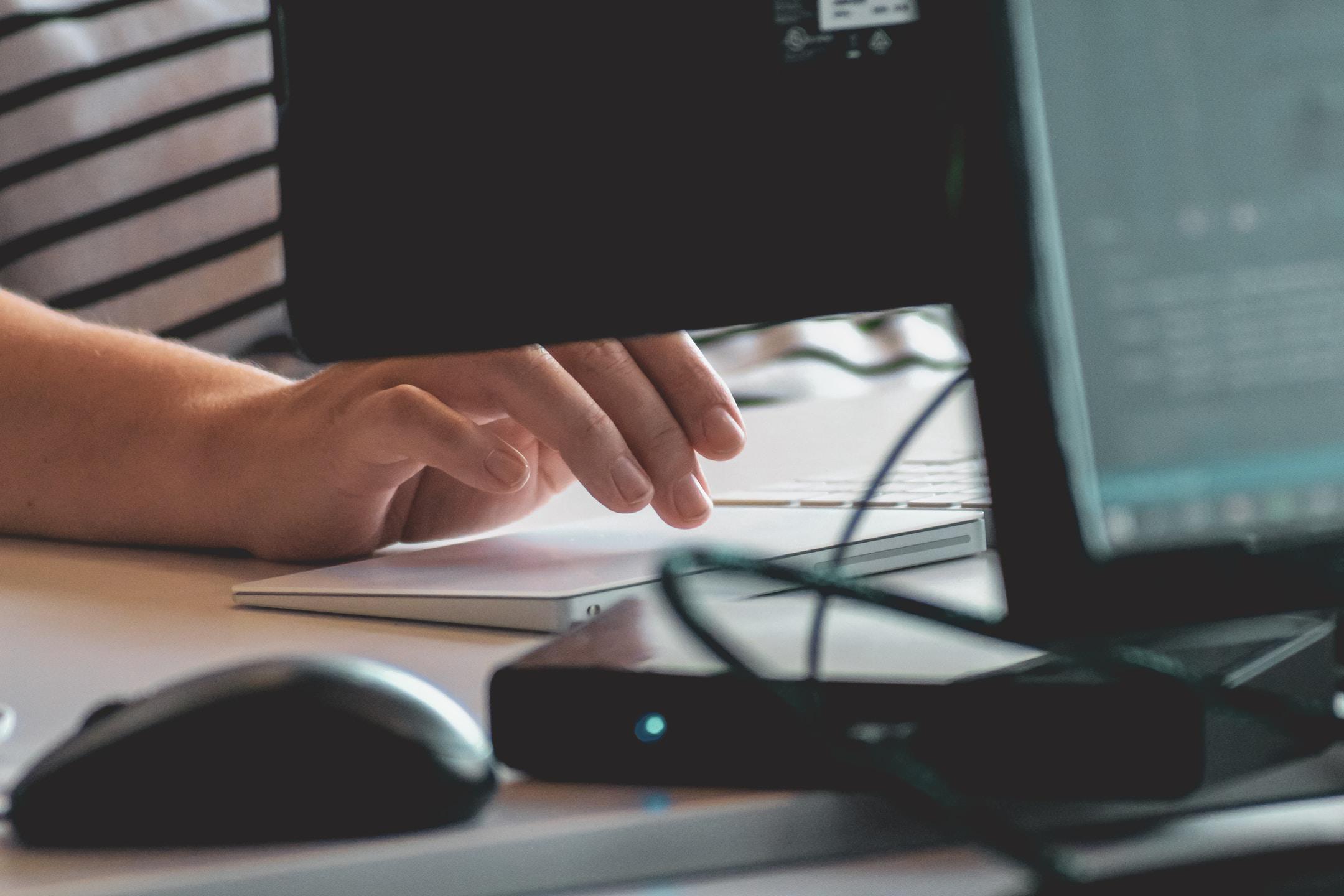A translator working on a computer.