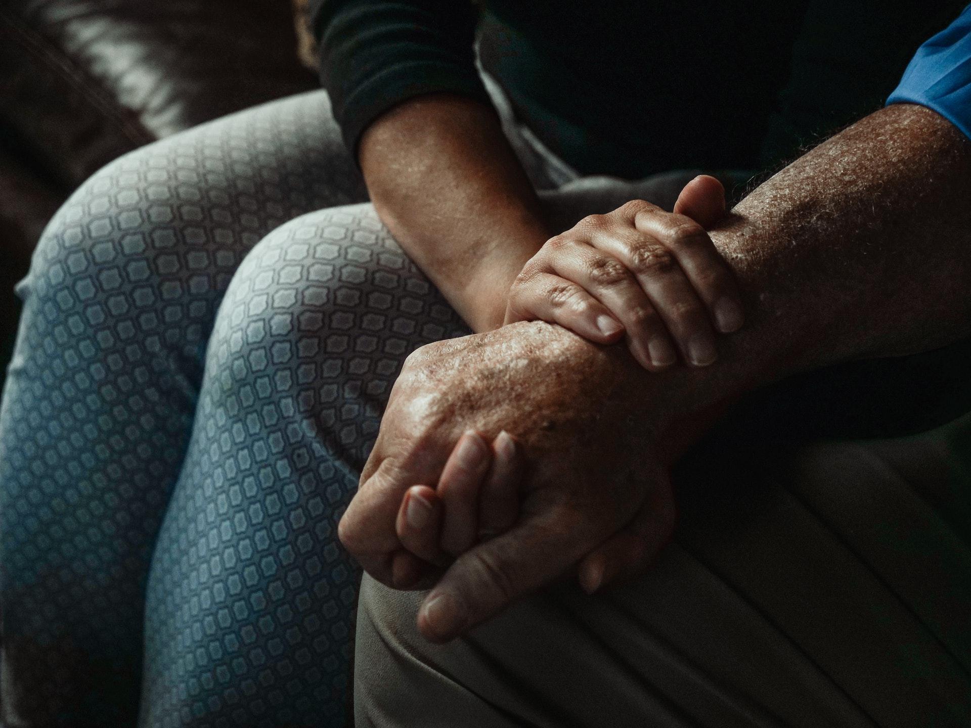 Holding hands with a dementia patient