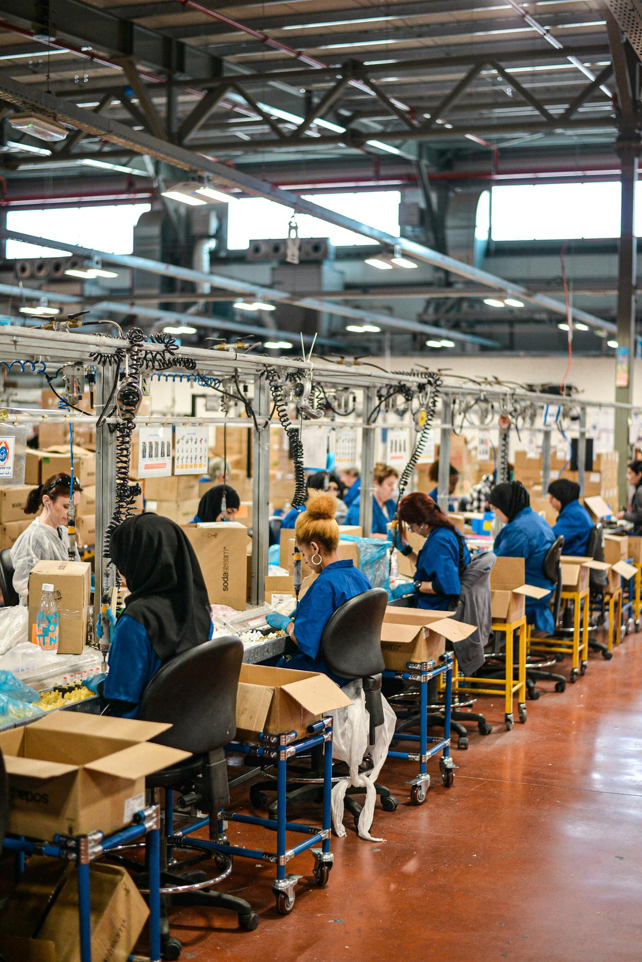 Women working on SodaSteam devices at the SodaStream factory in Israel. Shot during press trip to SodaStream factory in 2019.