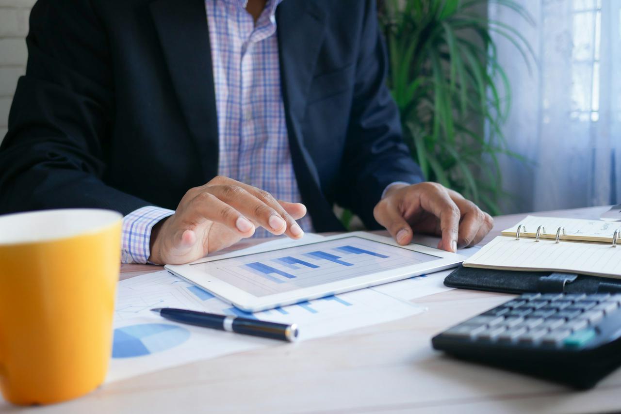 Finance professional working on graphs