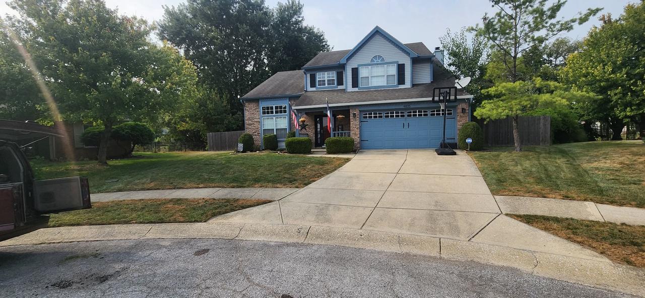 “Affordable lawn care service in Indianapolis — freshly mowed front yard and trimmed edges by CasaLux Outdoor Solutions, your trusted budget-friendly lawn care company.”