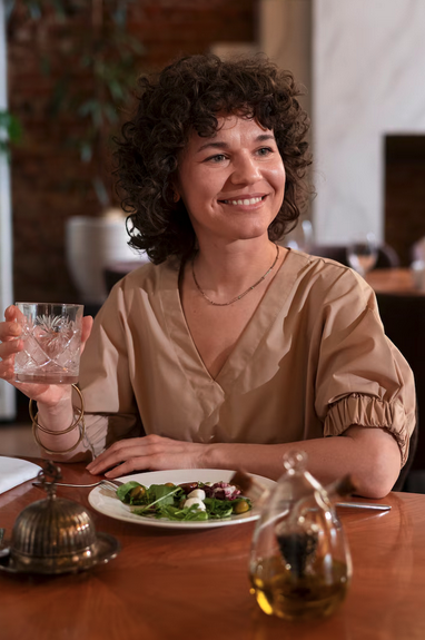 Woman enjoying a healthy dinner