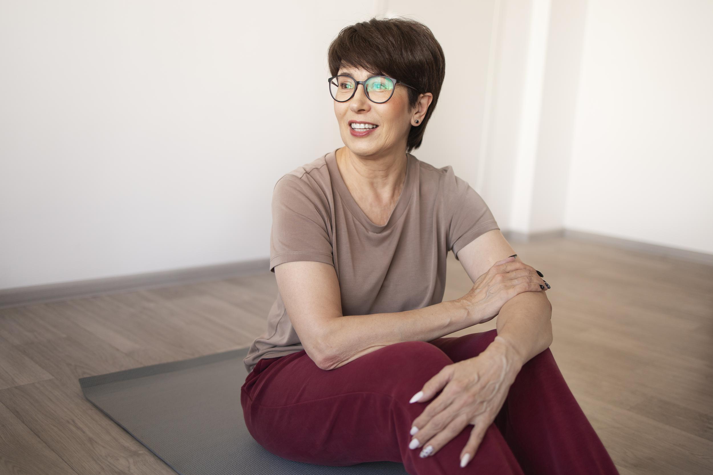 senior-woman-doing-yoga-home.jpg
