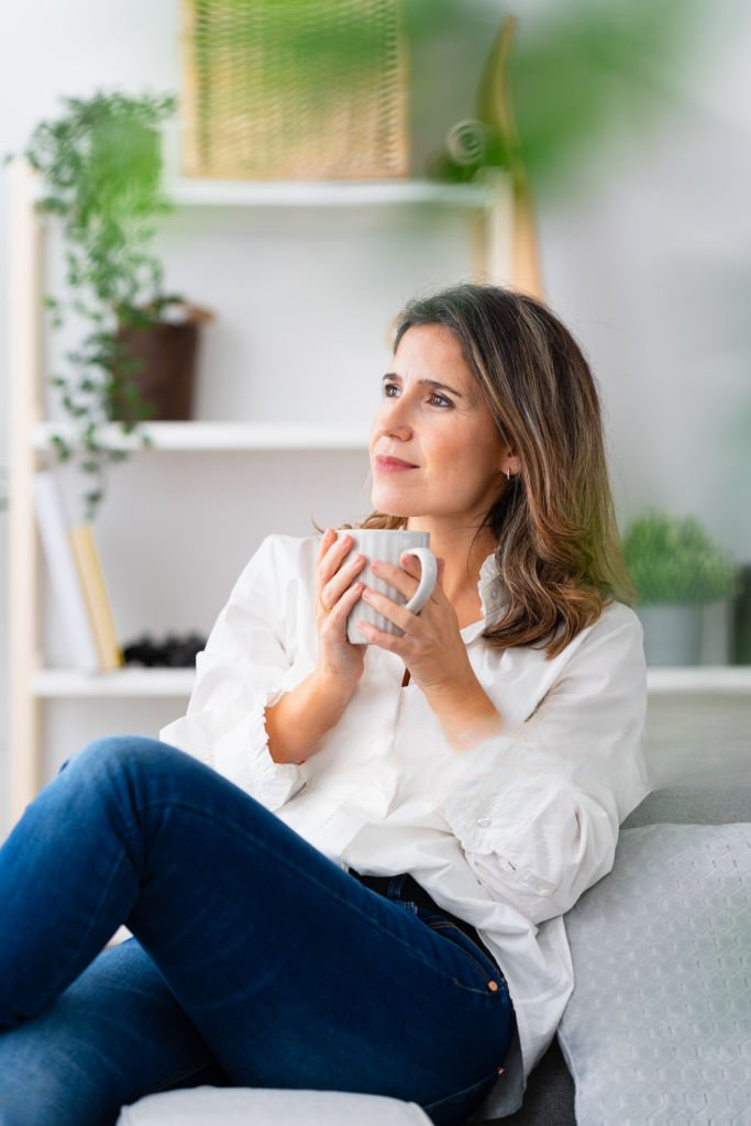Woman drinking tea relaxed