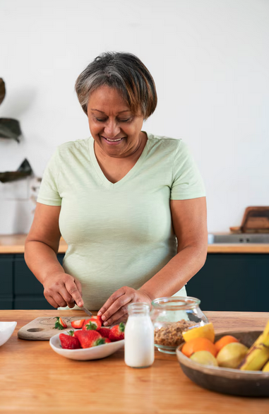 Senior woman preparing breakfast