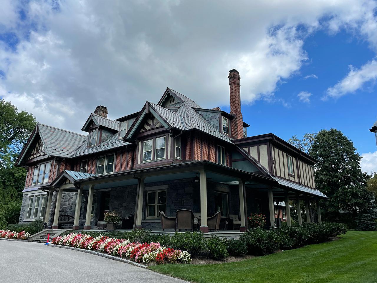 Traditional looking home with beautiful landscaping