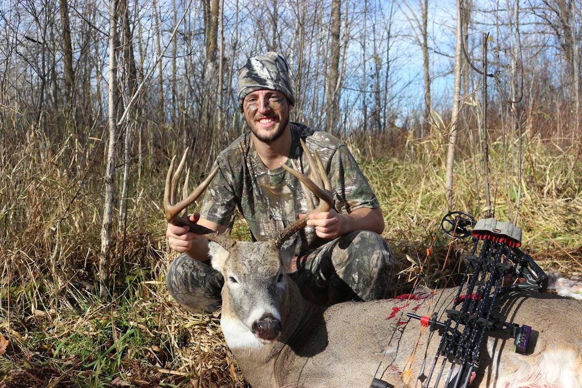 Image of a deer and a hunter benefting from private land conservation strategies.