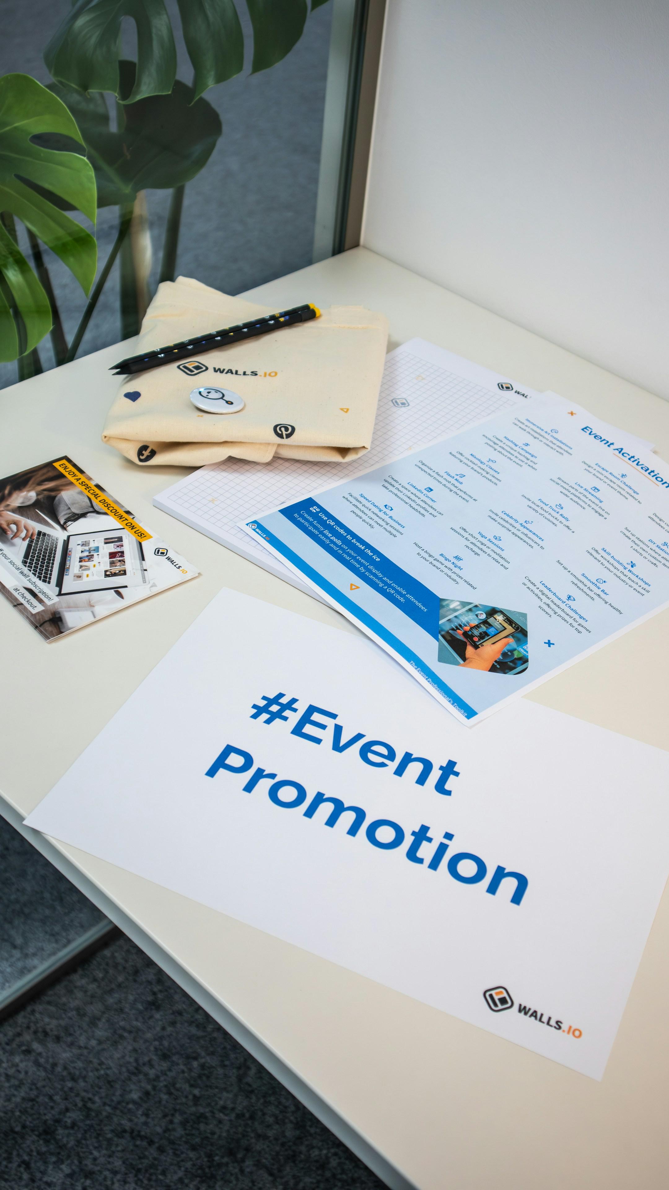 A collection of branded merch and freebies for events with the hashtag #EventPromotion