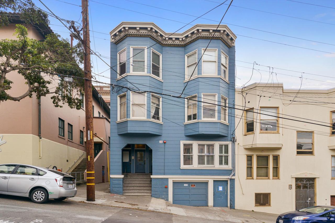 Blue building on a hill