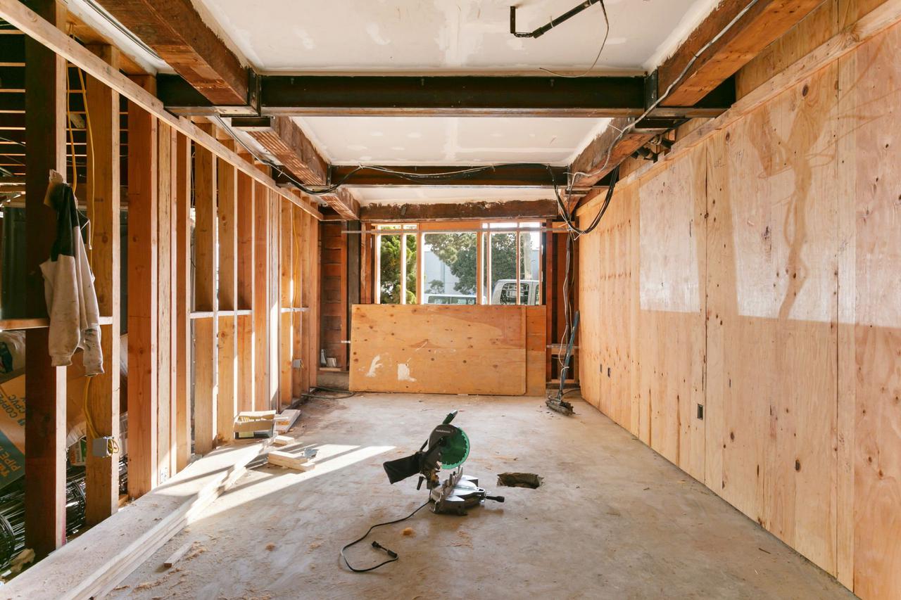 Building under construction with tools