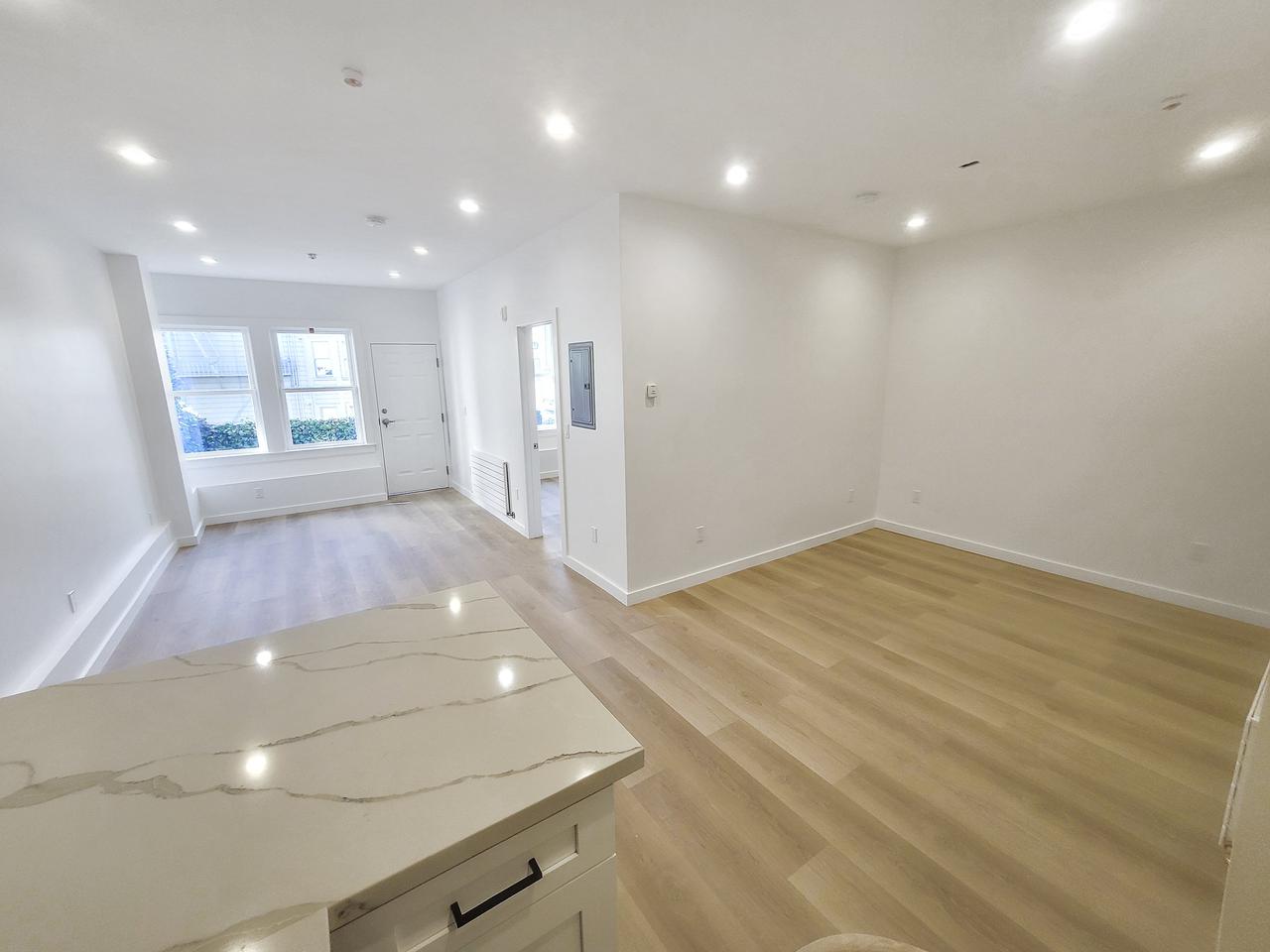 New home with hardwood floors and natural light