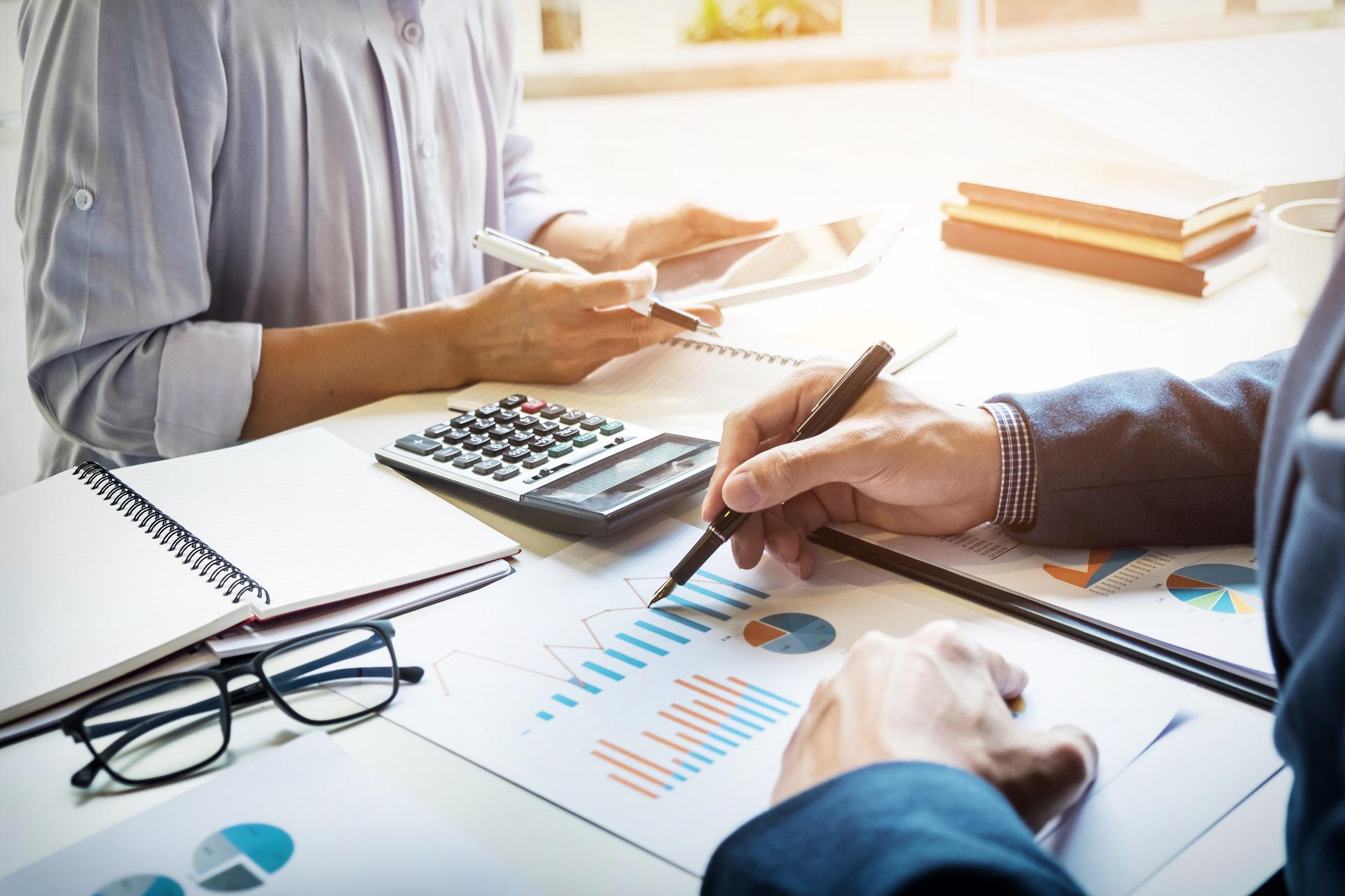 Akons Associates team working with clients on accounting and tax matters