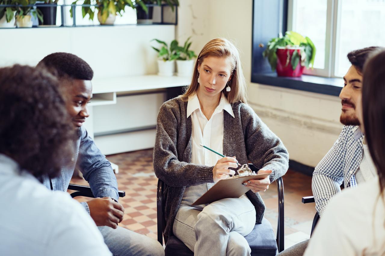 young-people-sitting-circle-having-discussion.jpg