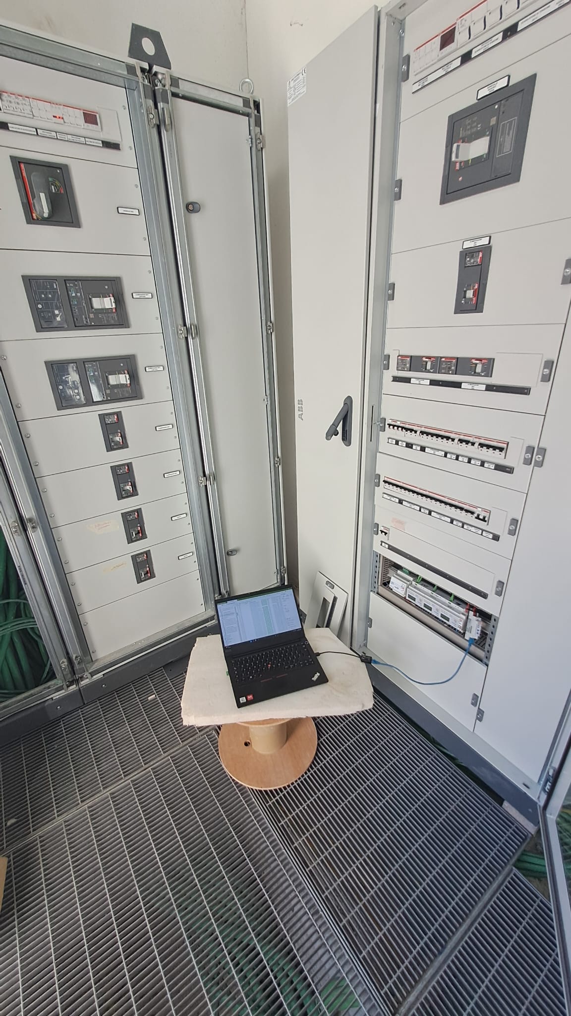 AuroraVolt electrician working on electrical panel installation