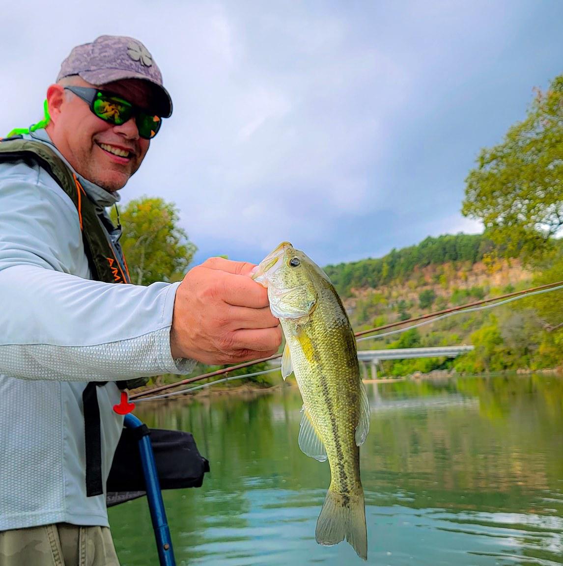 Custom Rod builder Phillip Pierceall holding a Texas bass.