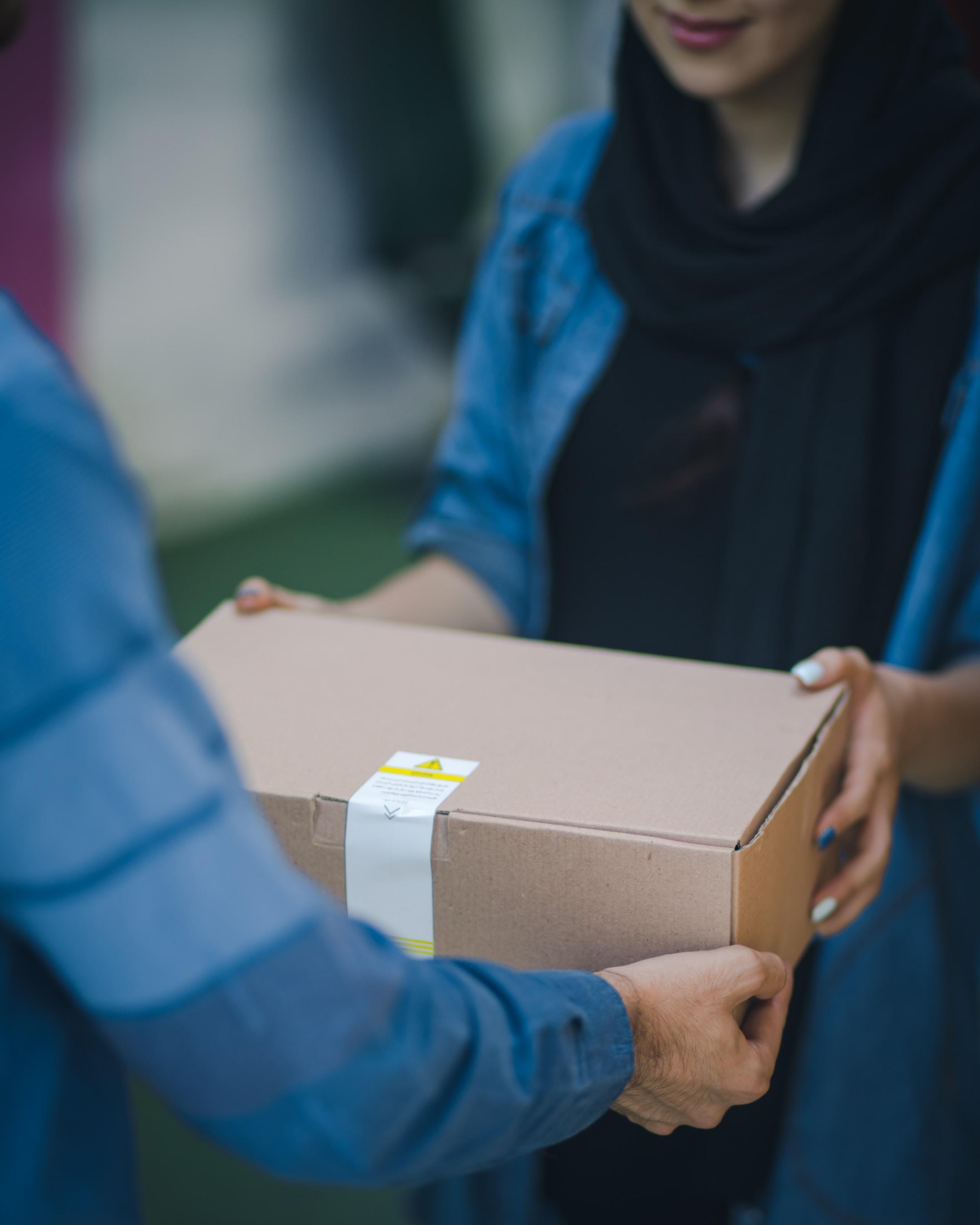 Image of an employee shipping dangerous goods.