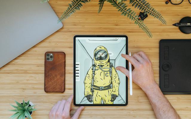 A drawing of a person in a hazmat suit on a tablet.