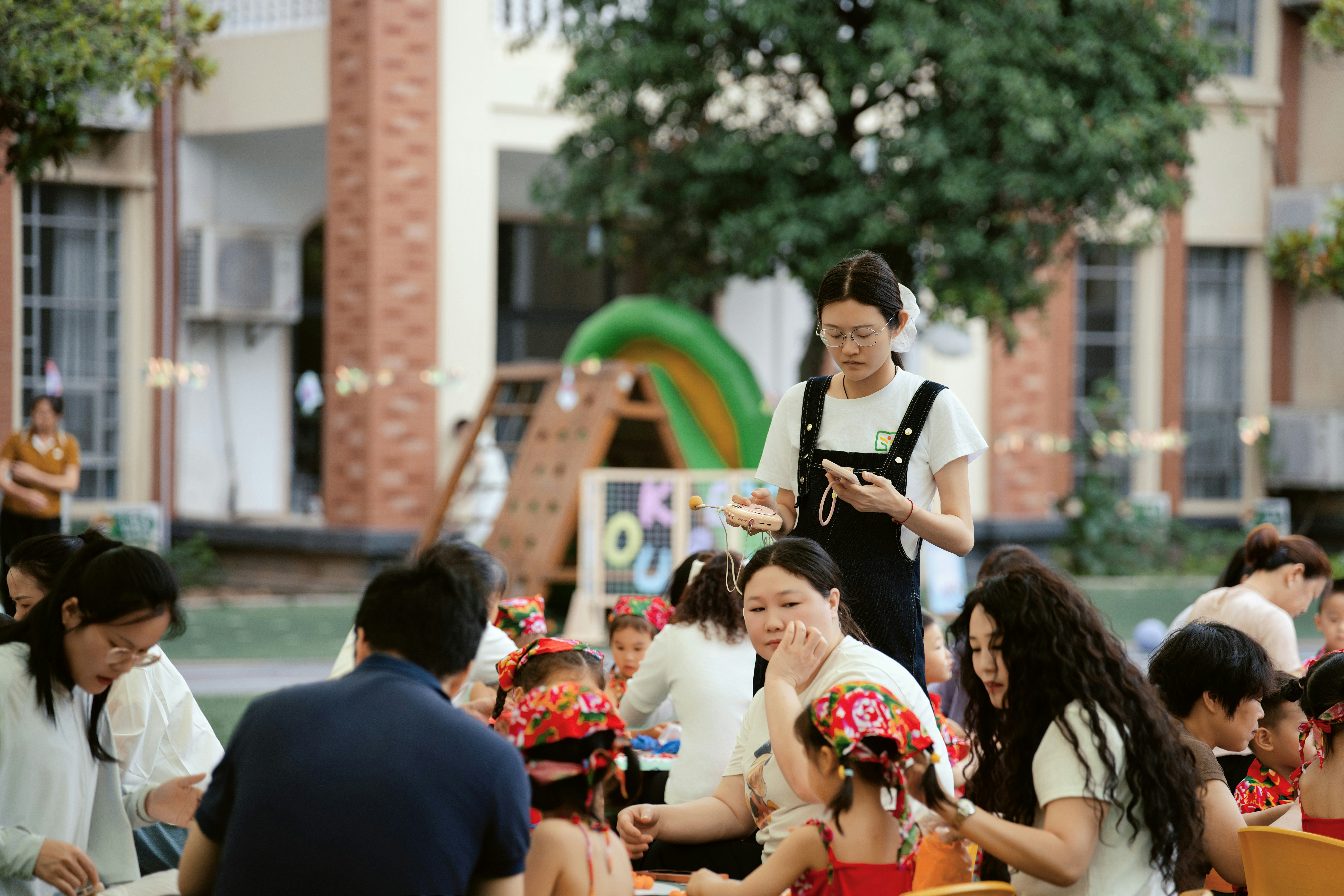 Adults and children enjoying an outdoor gathering