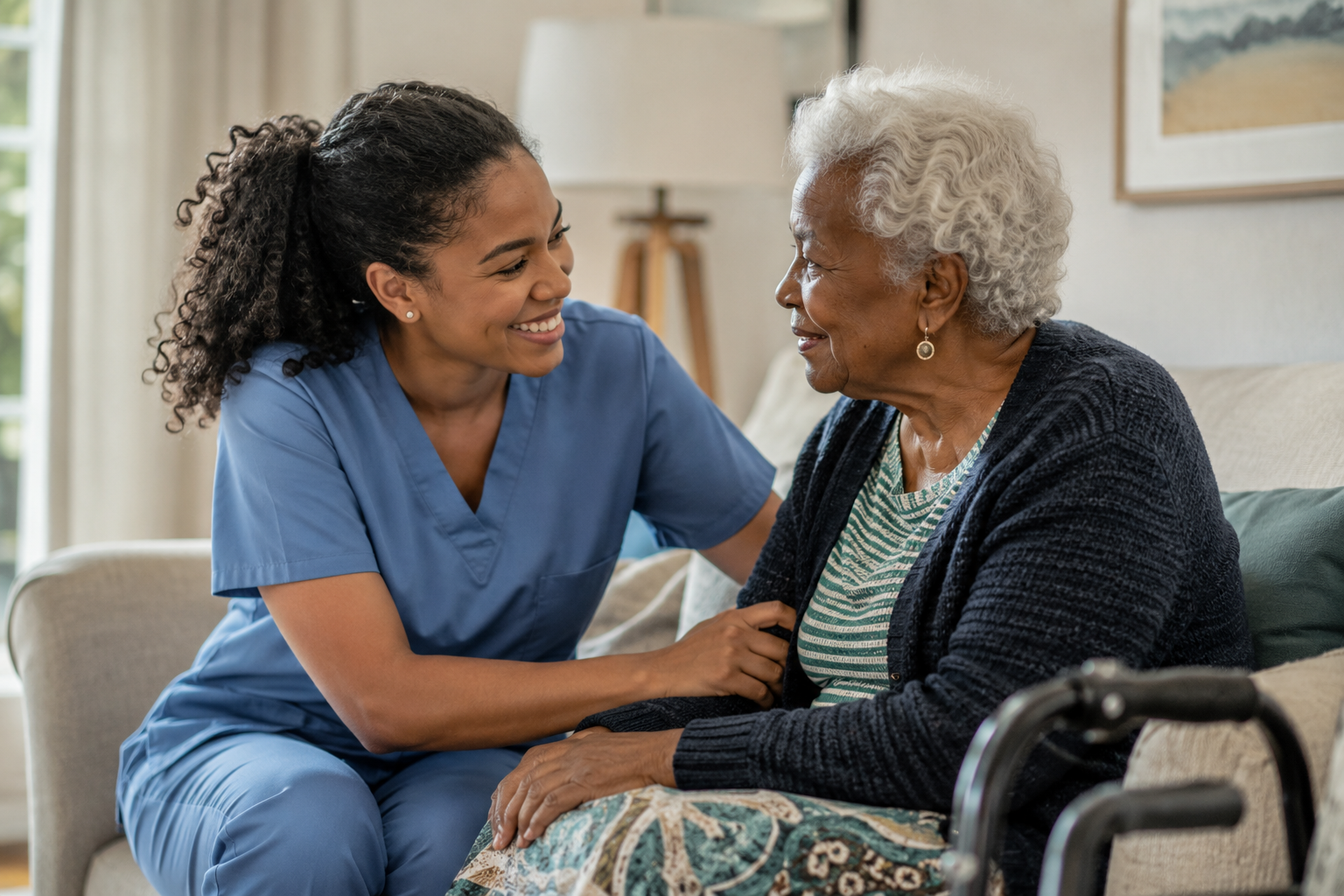 Caregiver and senior sharing a warm moment in golden light