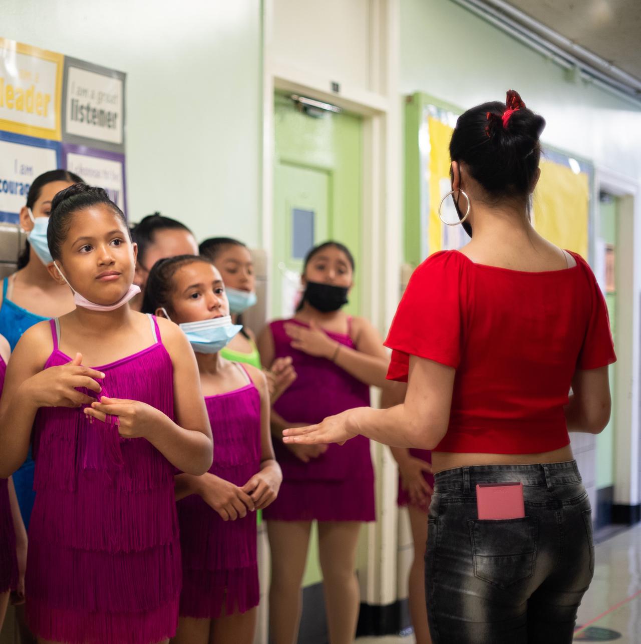 ximena with kids cropped.jpg