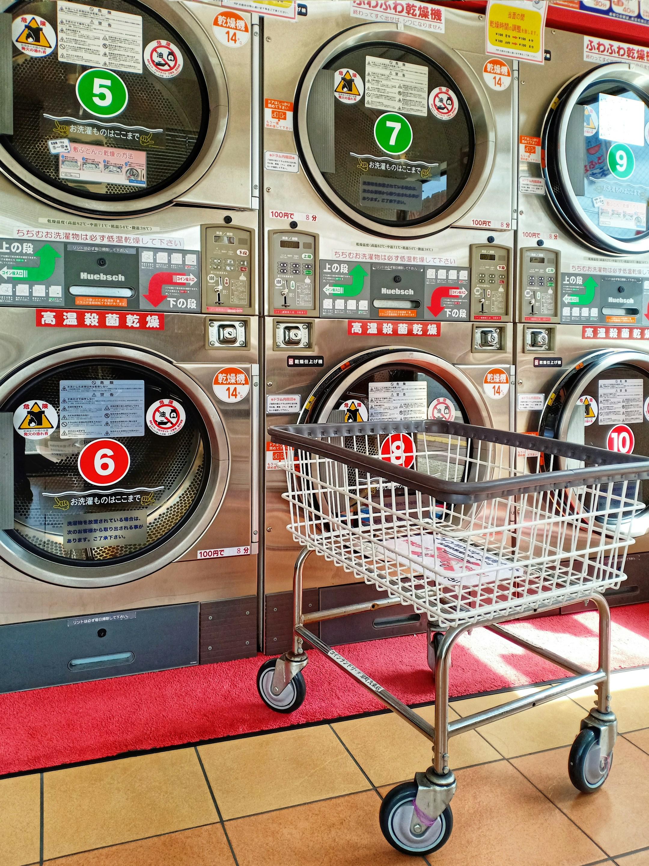 A trolley in a japanese laundromat