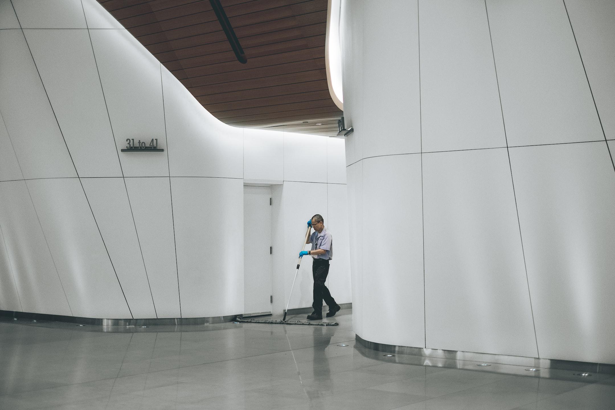 Image of a janitor performing a post-construction cleanup service.
