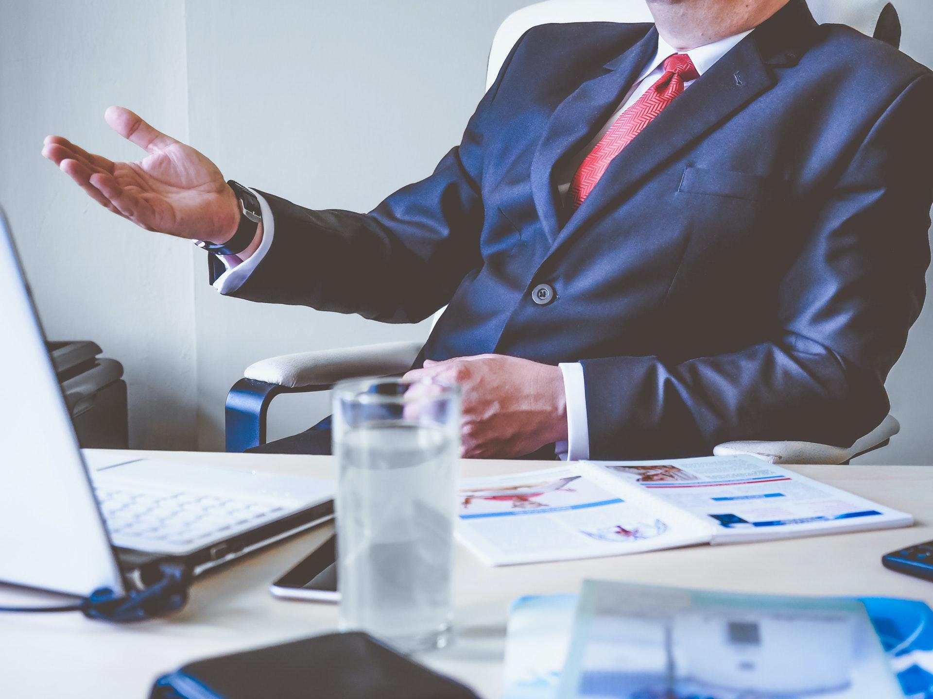 Consultant sitting at a desk