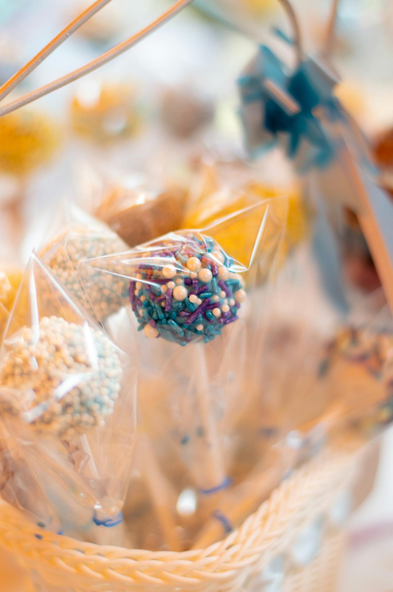 This image/photo of cake pops were taking during a Baby Shower in Mexico during the Summer of 2018. 
The table had many different Mexican treats, candies and fruits which were very delicious.