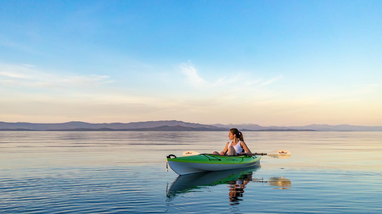 We were spending the week in Qualicum, BC and decided one evening to take our kayaks out to enjoy the sunset. Shortly after setting out on the water everything calmed down and the water turned to glass. I never thought the ocean could be so calm. The sunset was amazing as well. Purple hues were cast over the mountains in the distance. Everything reflected off the water like a mirror. It felt like we were in a dream.