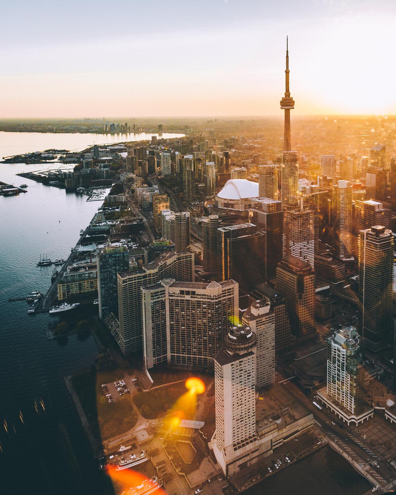 Sunset helicopter tour over downtown Toronto. Another beautiful day in a beautiful city. If you ever get a chance to  see a city by air go for it, you wont regret it!