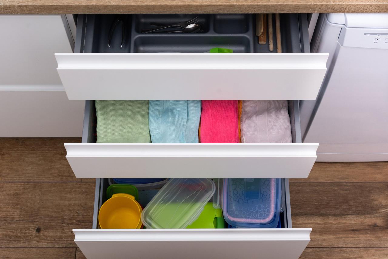 Drawers with wipes and containes and utensils.