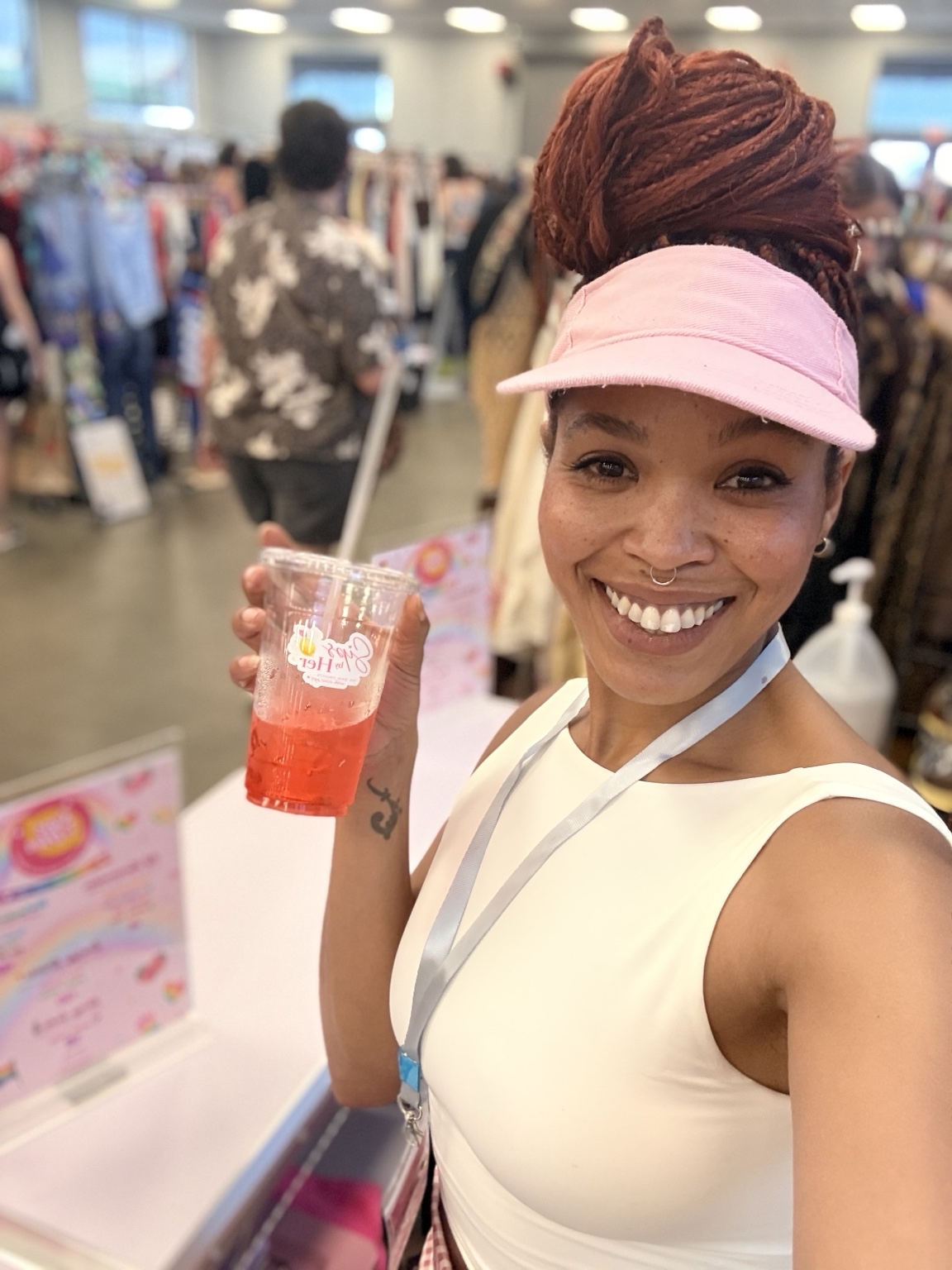 Holding a refreshing Sips drink